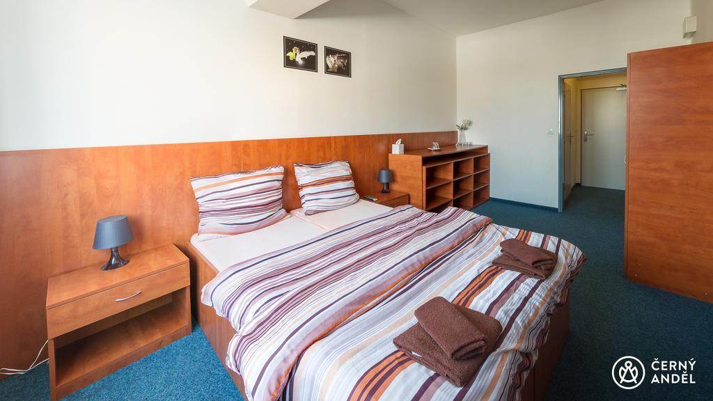 Cerny Andel Hotel Most Bagian luar foto